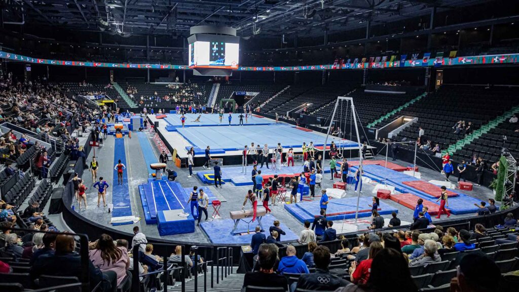 A view of a gymnastics competition from the stands