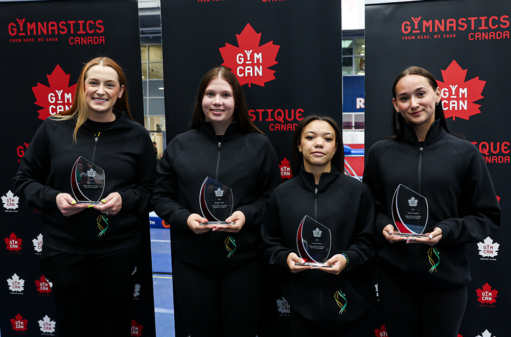 Senior Athletes Katie Thompson, Jerusha Weeks, and Meagan Kasian with Senior Coach Danielle Roy (SK)