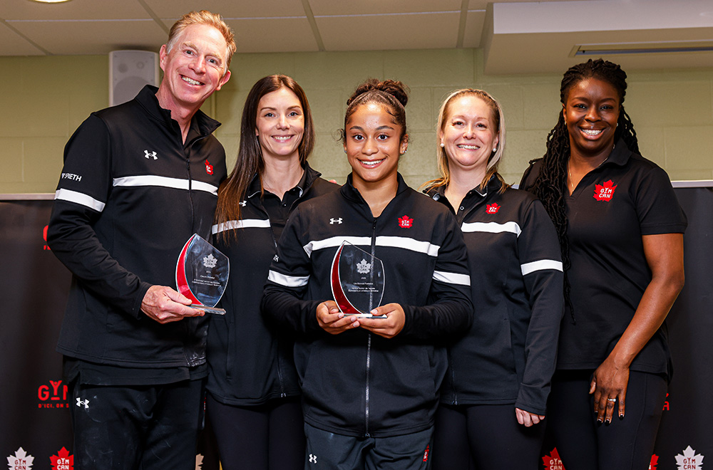 Senior athlete of the year Lia-Monica Fontaine with coaching team